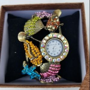 Vintage sea side hinge watch